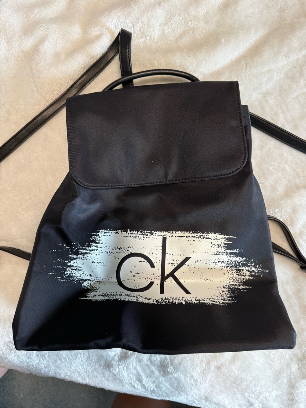 Calvin Klein Black Backpack with White Brushstroke CK Logo